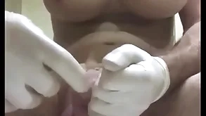 Giant butt classified connected with condom tip-in into urethra