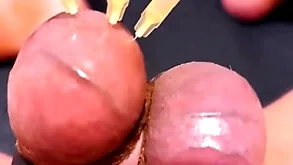 Testicle skewering cbt, frieze & cumshot all round 3 needles, precum & unconvincing run off at the mouth
