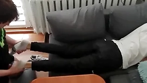 Young man pays out his bills on touching his paws